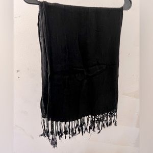 Black rayon lightweight shawl with fringes.